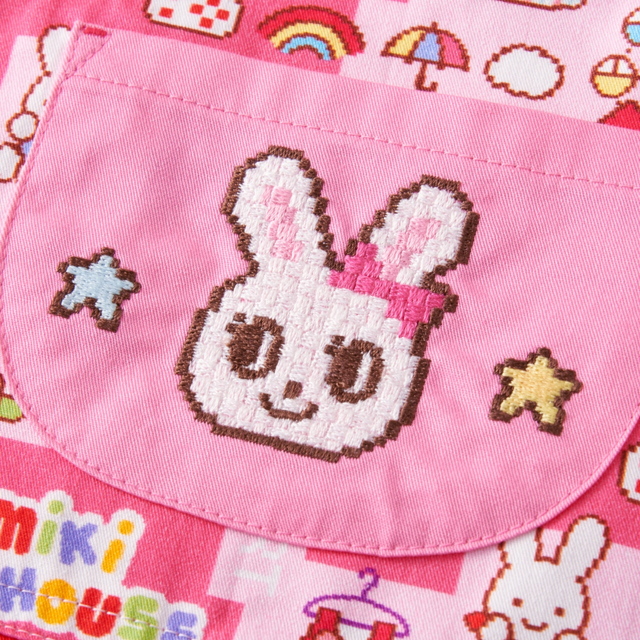 Jumper skirt with retro video game-style print