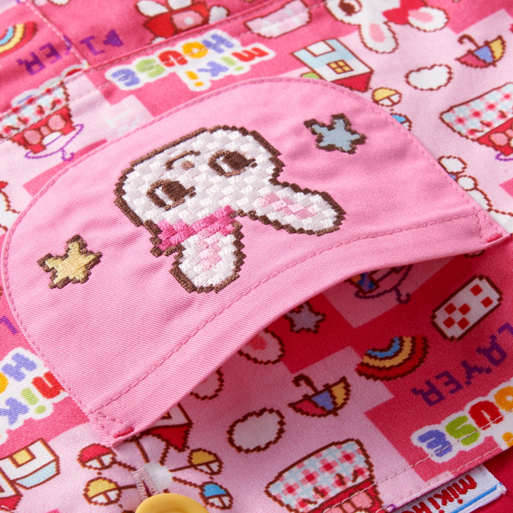 Jumper skirt with retro video game-style print