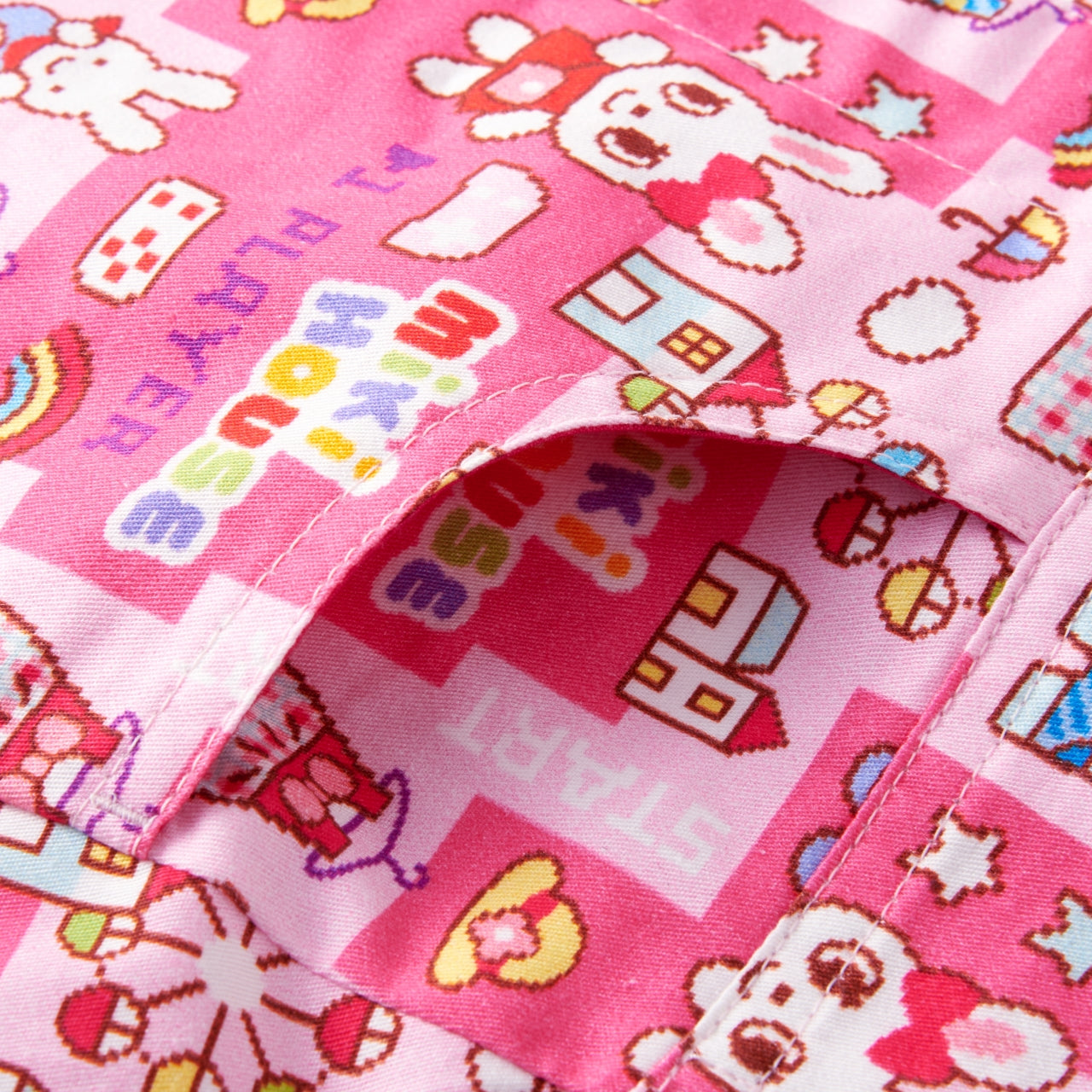 Jumper skirt with retro video game-style print