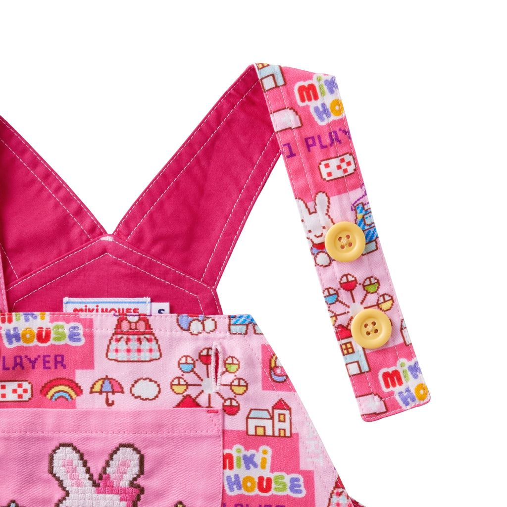 Jumper skirt with retro video game-style print